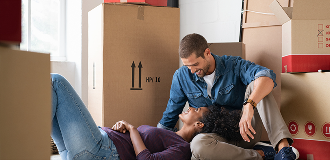 Couple sitting in new home
